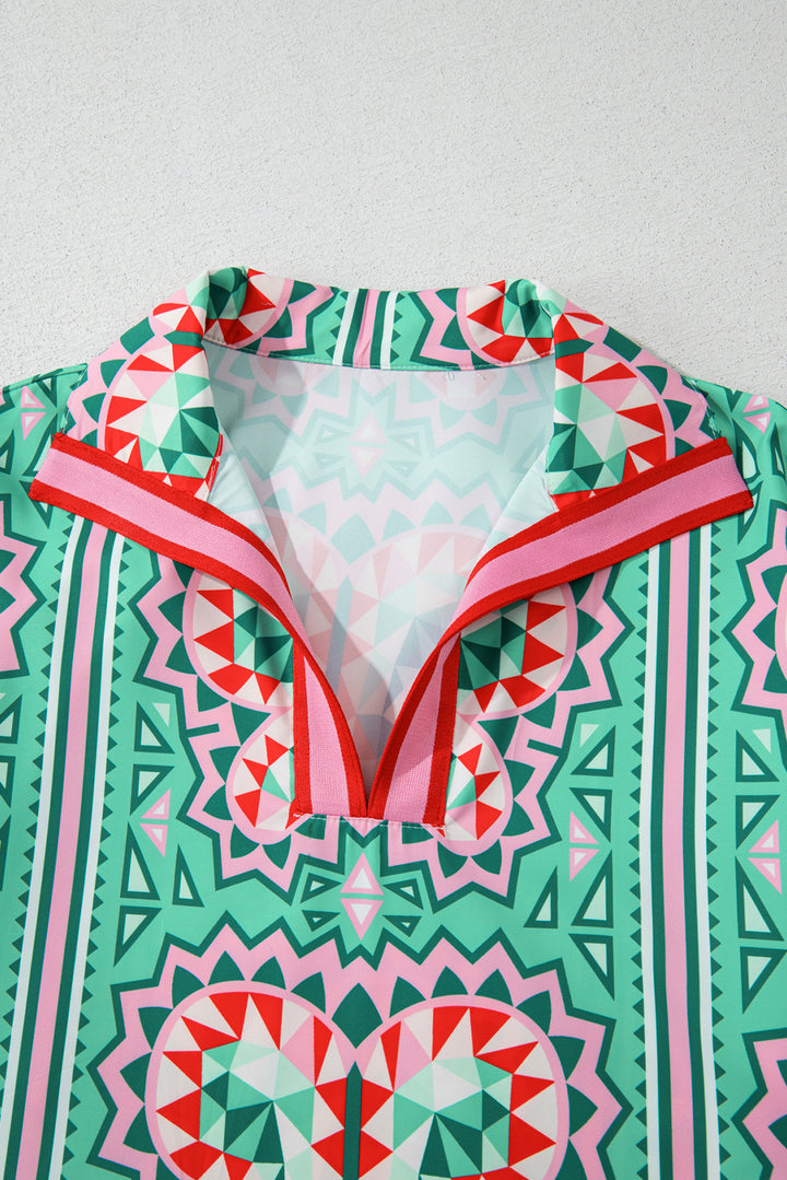 Robe à manches courtes et col fendu vert menthe à imprimé papillon géométrique