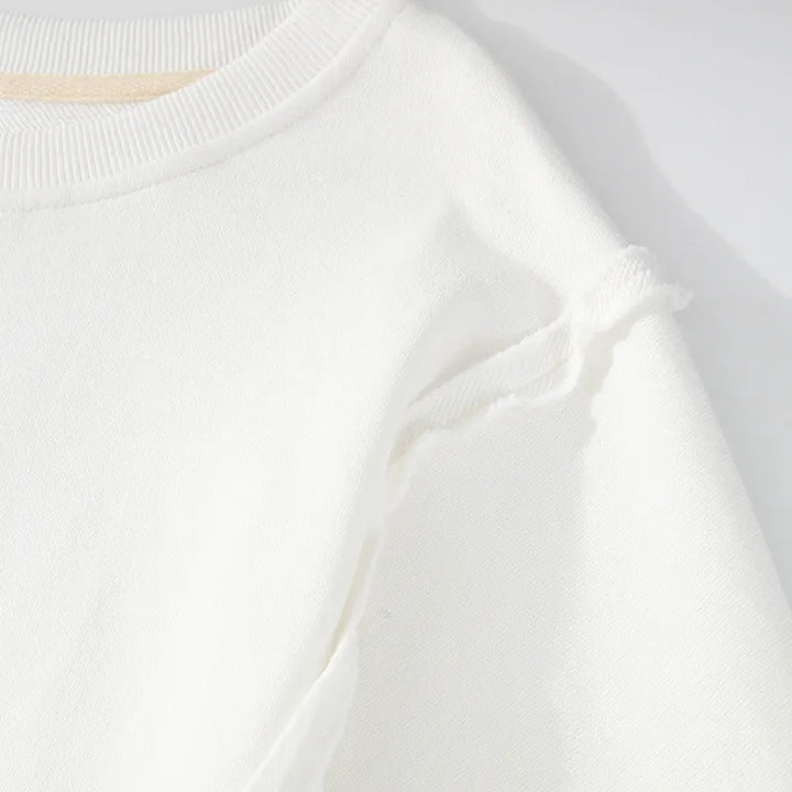 Exposed Seam High-Low Long Sleeve Sweatshirt