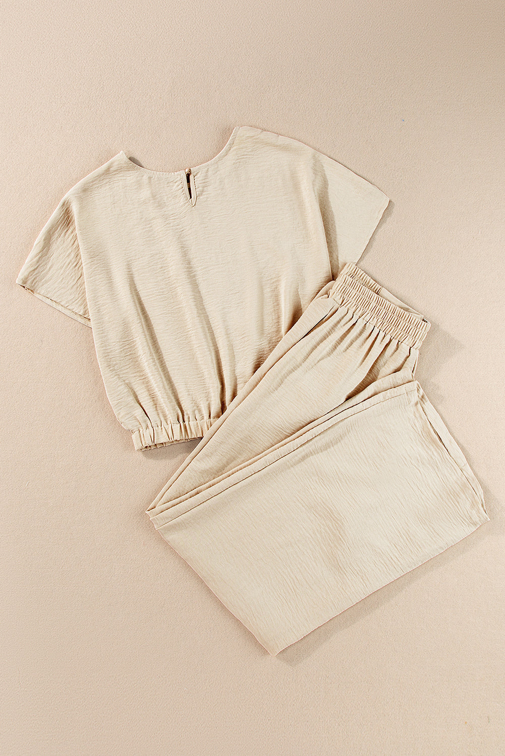 Ensemble t-shirt court beige froissé à ourlet élastique et pantalon large