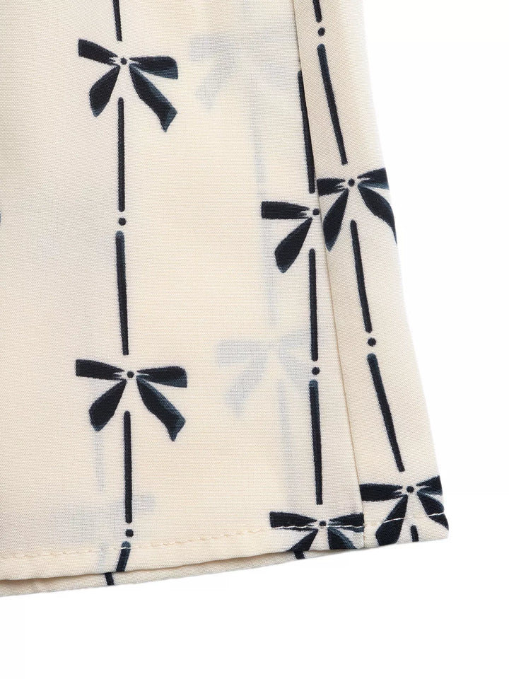 Bow Print Halter Neck Smocked Romper