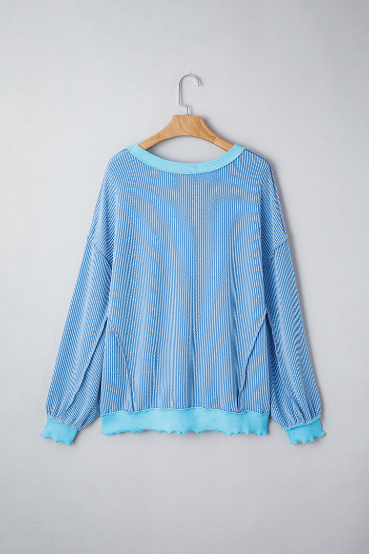 Myosotis Twisted Rib Uneven Hem Drop Shoulder Loose Knit Top