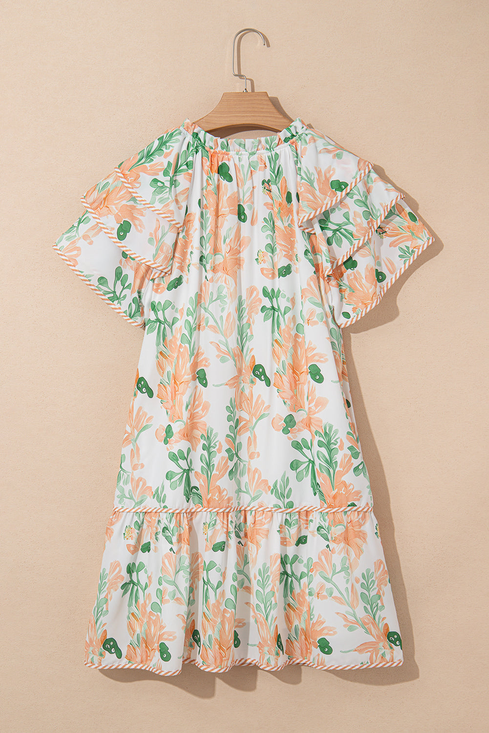 Mini-robe orange à manches courtes et bordures contrastées à fleurs