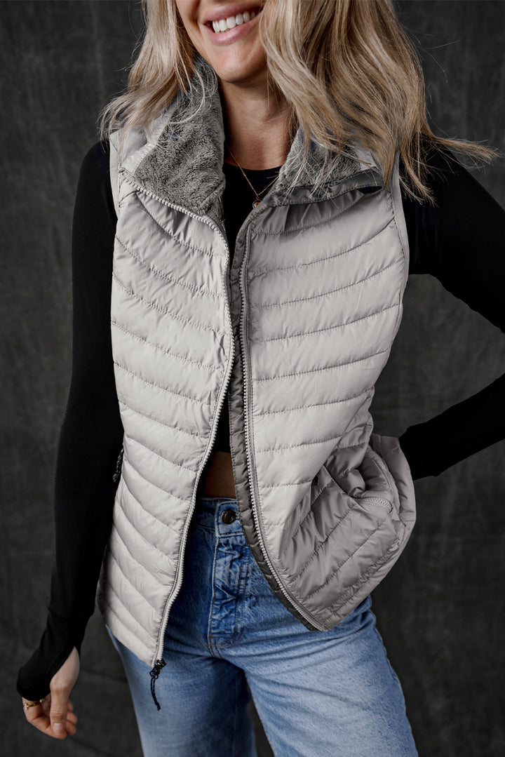 Gilet matelassé zippé à col en peluche argentée