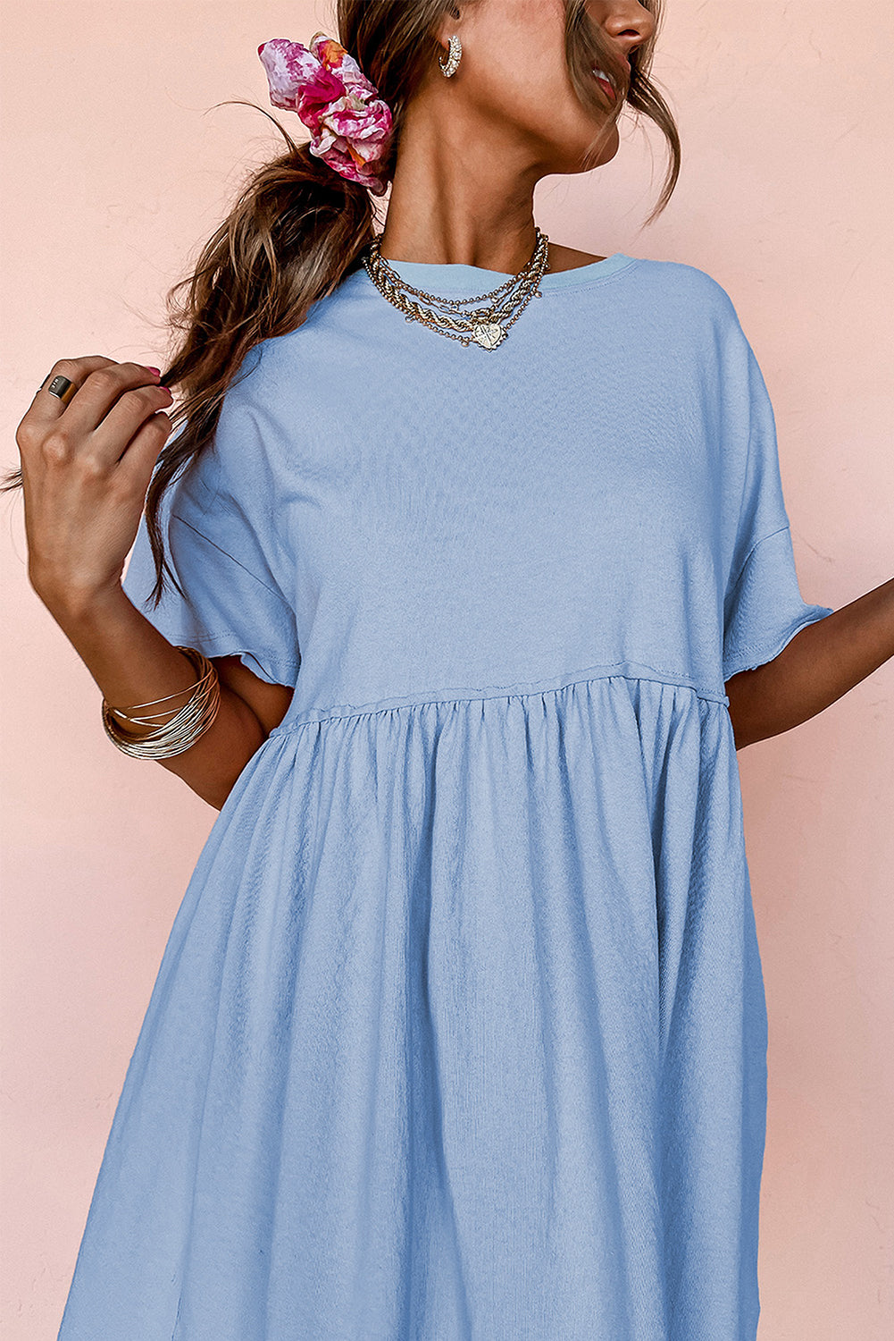 Robe babydoll bleu ciel unie à poches et bords bruts