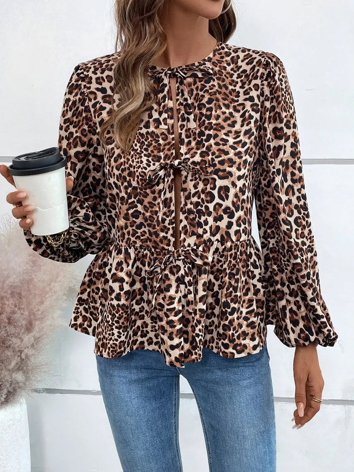 Ivy Lane Peplum Tied Long Sleeve Blouse