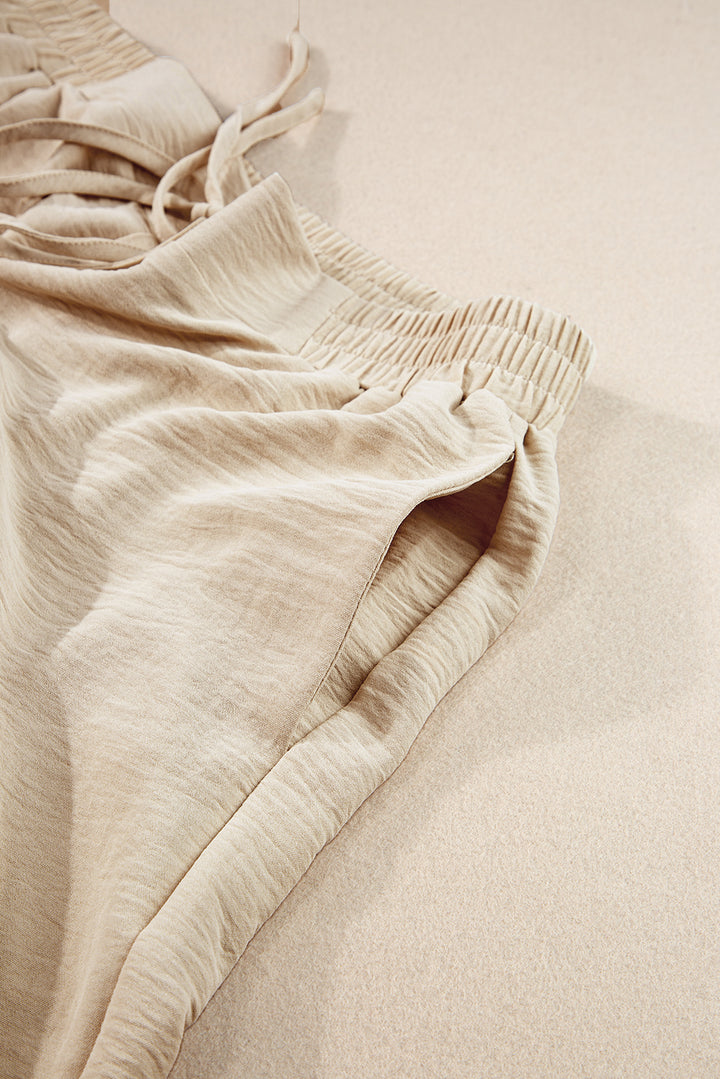Ensemble t-shirt court beige froissé à ourlet élastique et pantalon large
