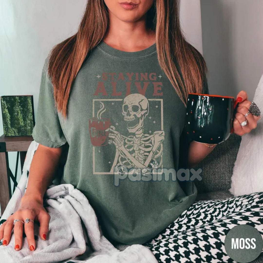 'Staying Alive' Coffee Shirt – Skeleton Retro T-shirt, Funny Coffee Lovers Gift, Daily Grind Tee, Women's Comfort Colors Apparel