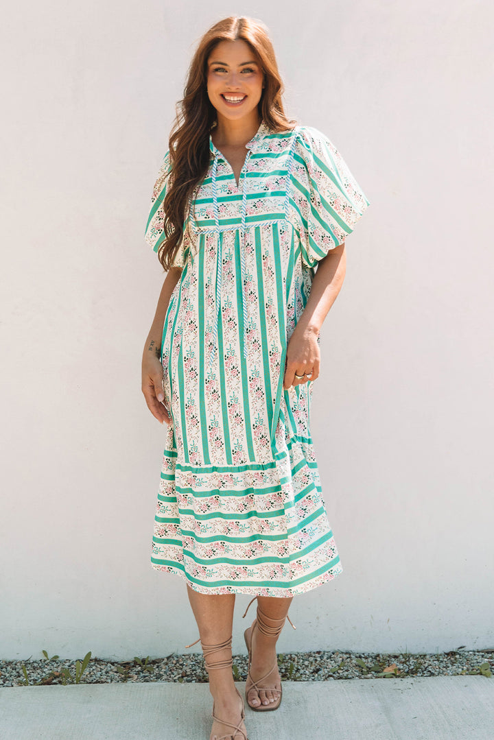 Robe mi-longue à rayures multicolores et imprimé floral, col fendu et manches bouffantes