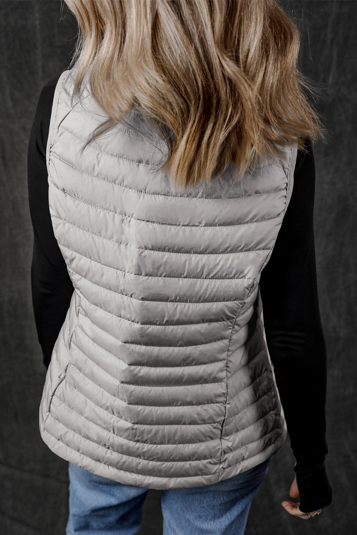 Gilet matelassé zippé à col en peluche argentée