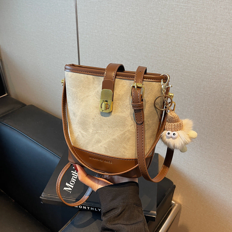 Vintage Bucket Crossbody Bag with Plush Charm
