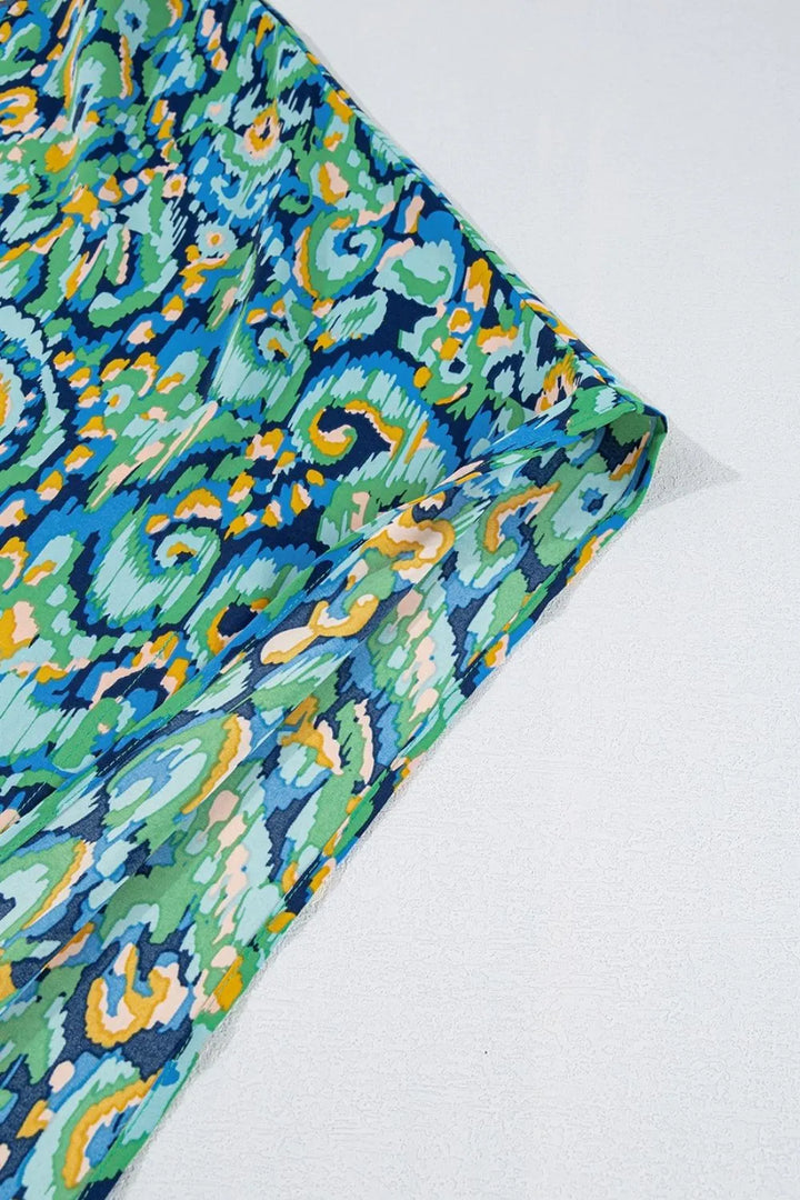 Abstract Print V Neck Half Sleeve Loose Fit Blouse