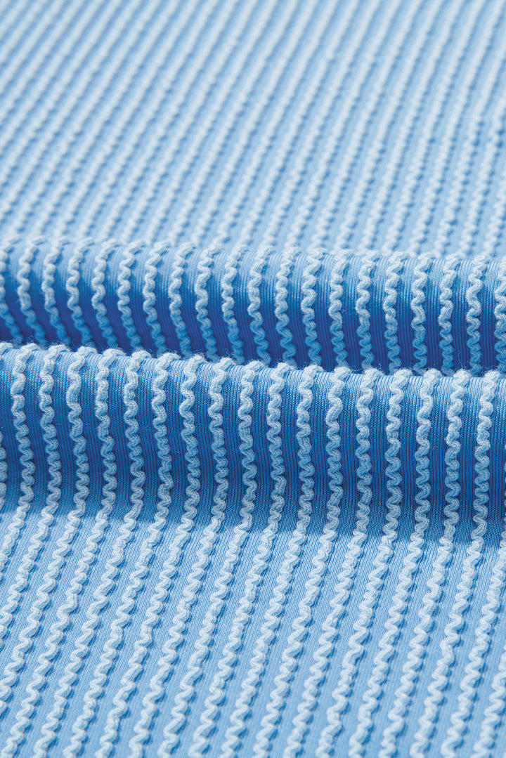 Myosotis Twisted Rib Uneven Hem Drop Shoulder Loose Knit Top