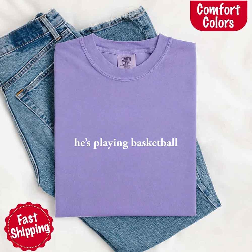 He’s Playing Basketball – Funny Sports Girlfriend Comfort Color Shirt for Women