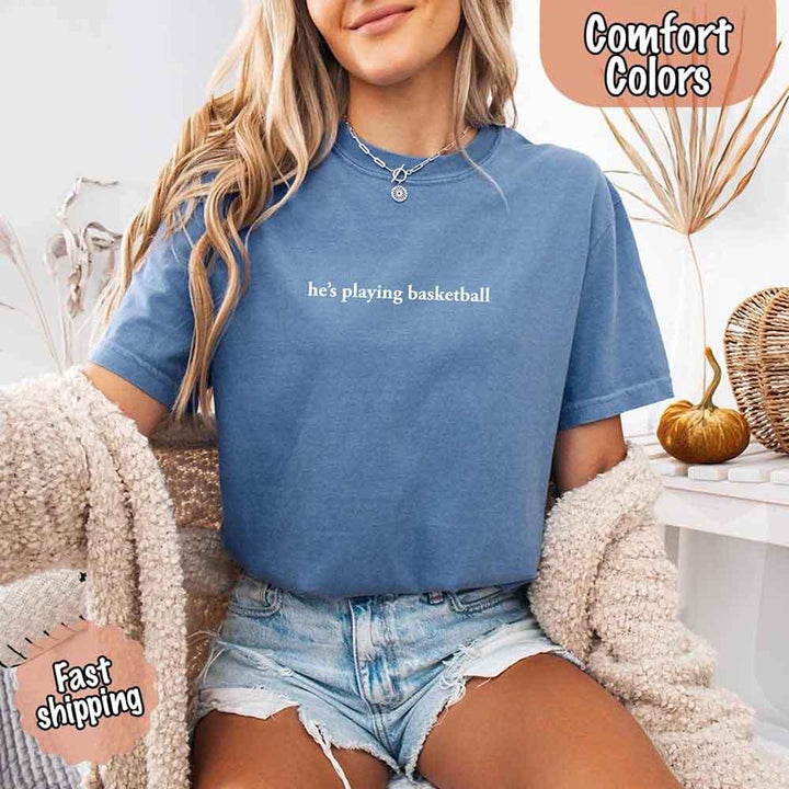 He’s Playing Basketball – Funny Sports Girlfriend Comfort Color Shirt for Women