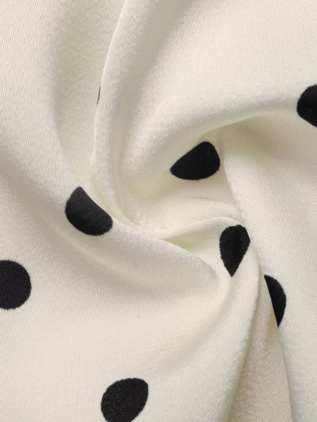 Polka Dot Sleeveless Peplum Blouse