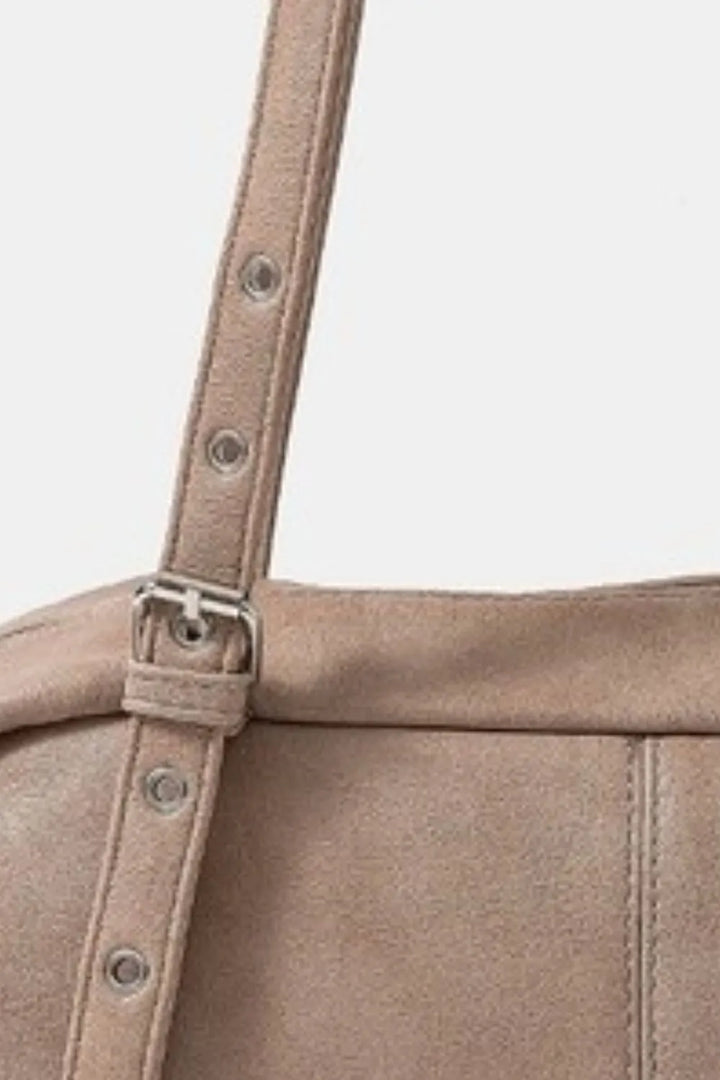 Fame Multi Grommet Belt Strap Rustic Rectangular Hand Bag