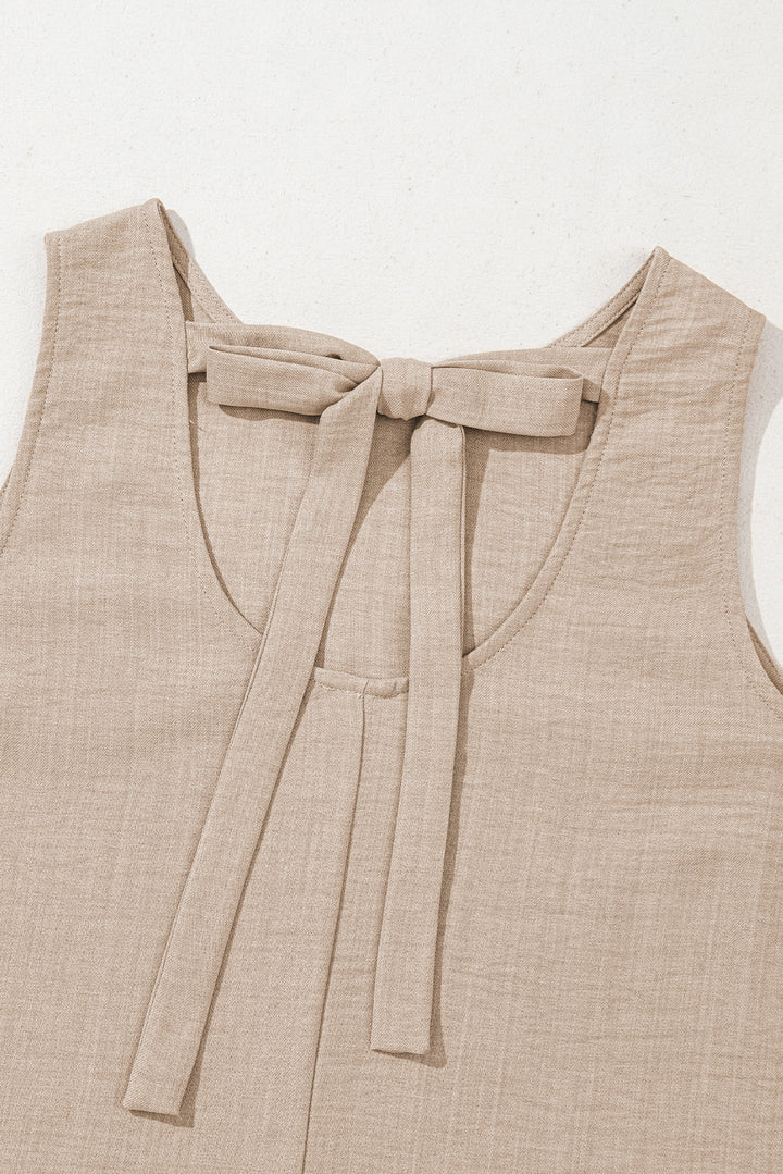 Robe courte sans manches gris fumé à dos échancré et ourlet à volants