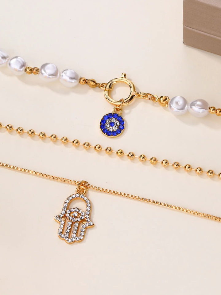 Layered Pearl Chain Evil Eye Hamsa Pendant Necklace