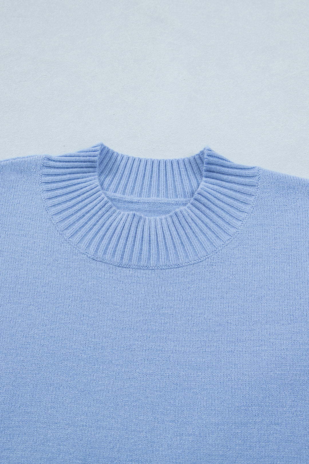 Beau Blue Solid Color Ribbed Trim Round Neck Ruffle Short Sleeve Sweater