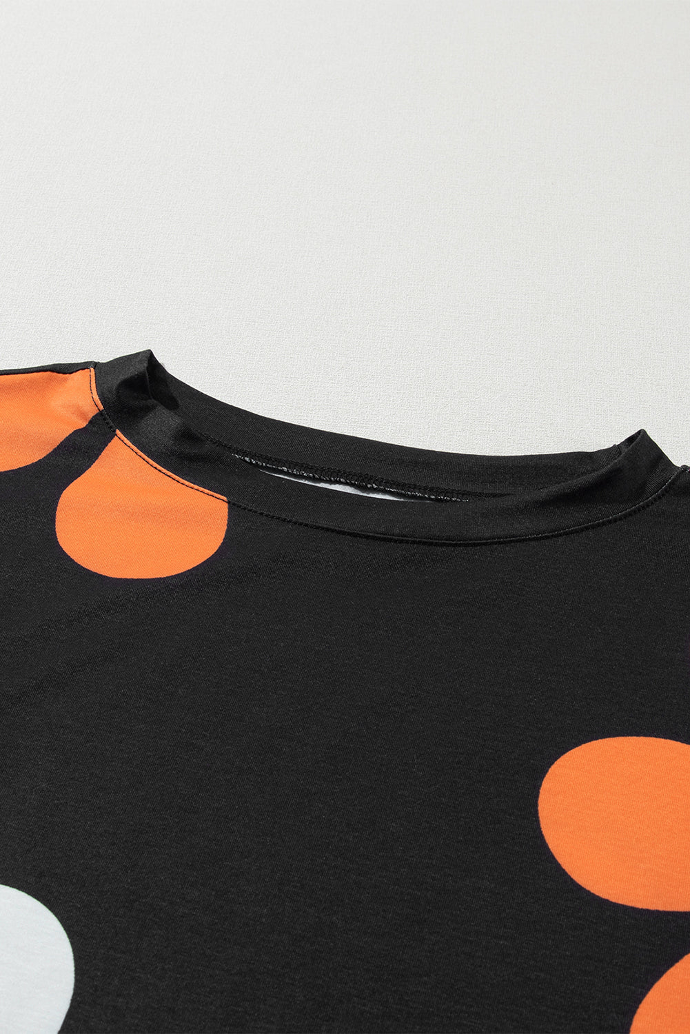 T-shirt à manches bouffantes et imprimé floral noir