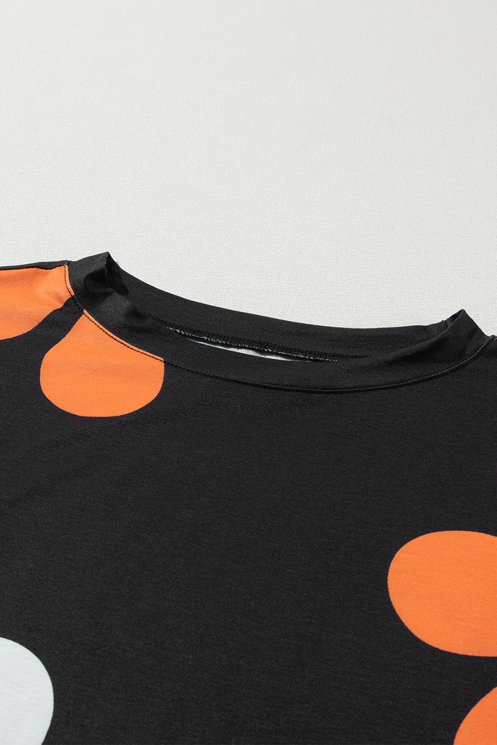 T-shirt à manches bouffantes et imprimé floral noir