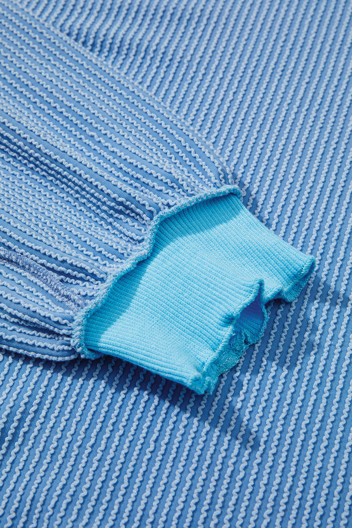 Myosotis Twisted Rib Uneven Hem Drop Shoulder Loose Knit Top