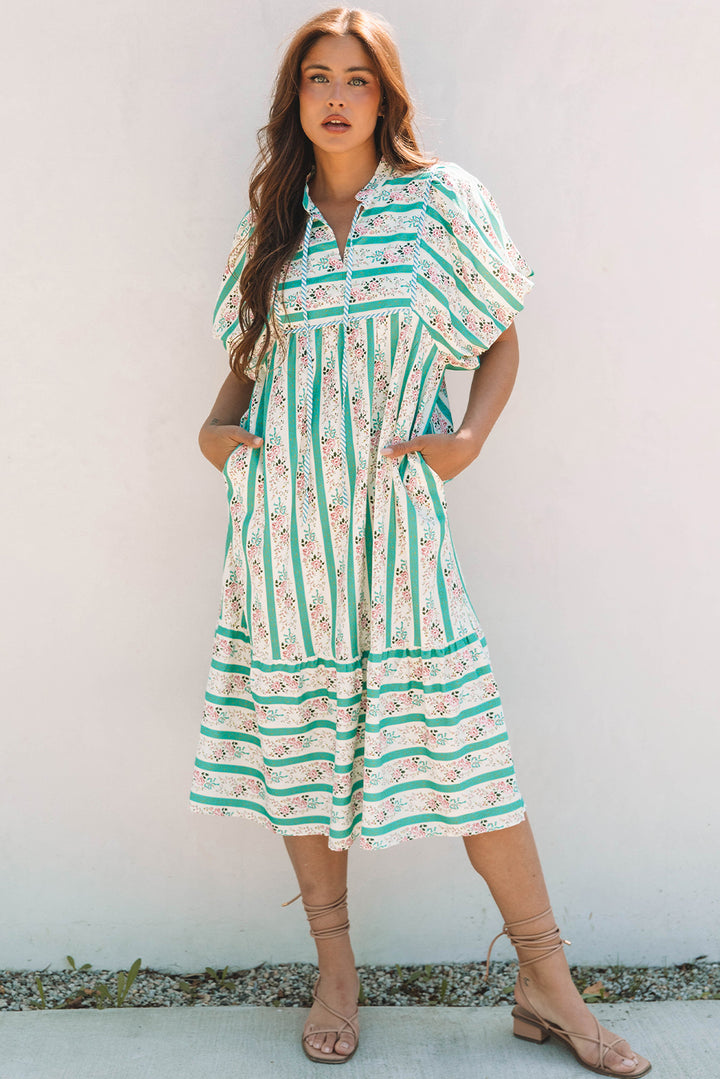 Robe mi-longue à rayures multicolores et imprimé floral, col fendu et manches bouffantes