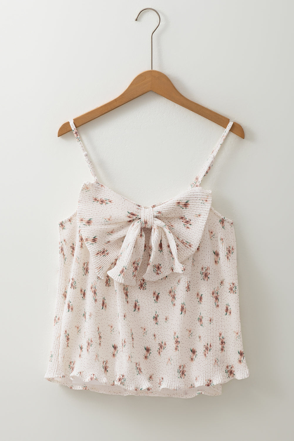 Débardeur blanc à bretelles spaghetti et gros nœud dans le dos, motif floral plissé