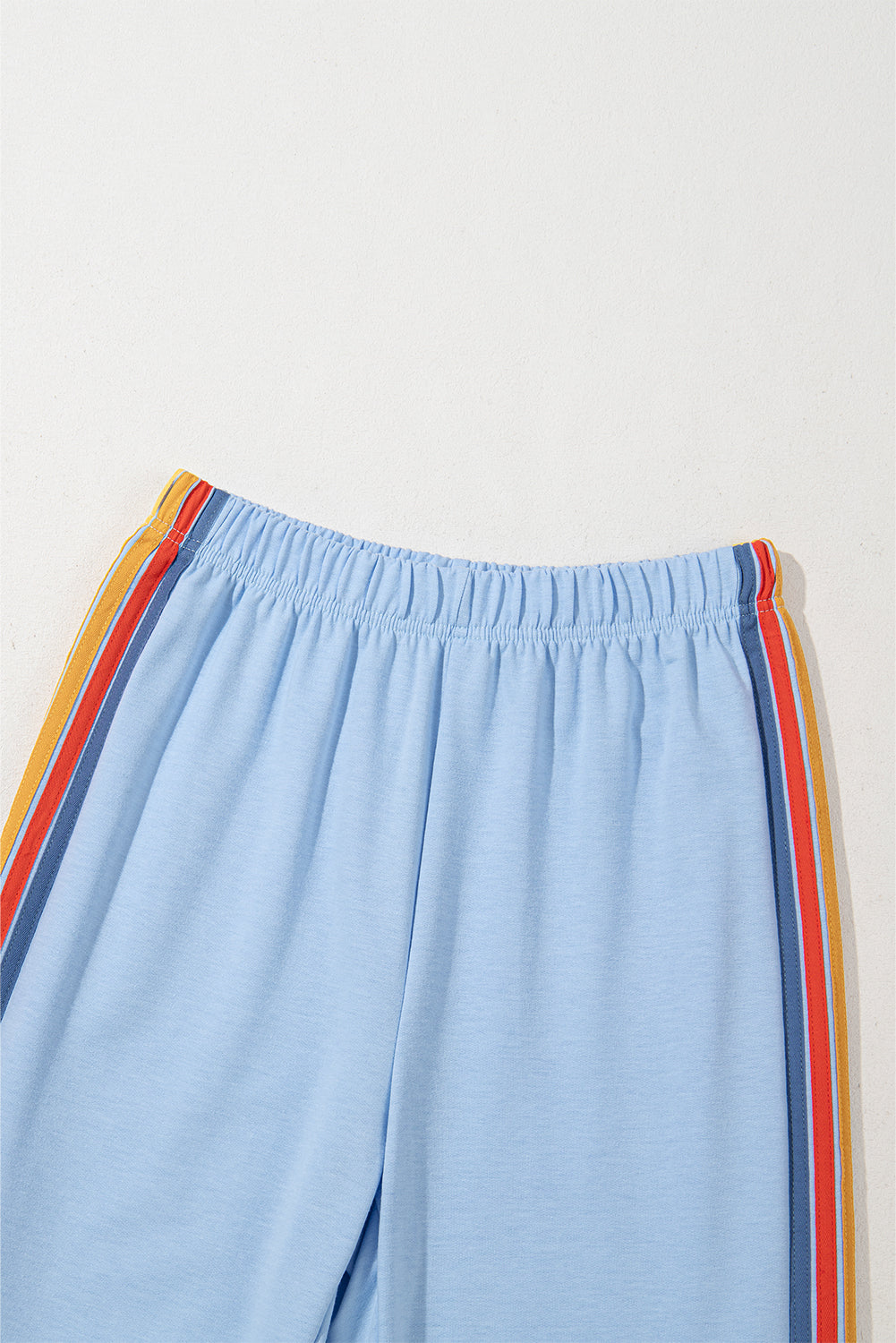 Pantalon de survêtement taille haute bleu clair à motif arc-en-ciel