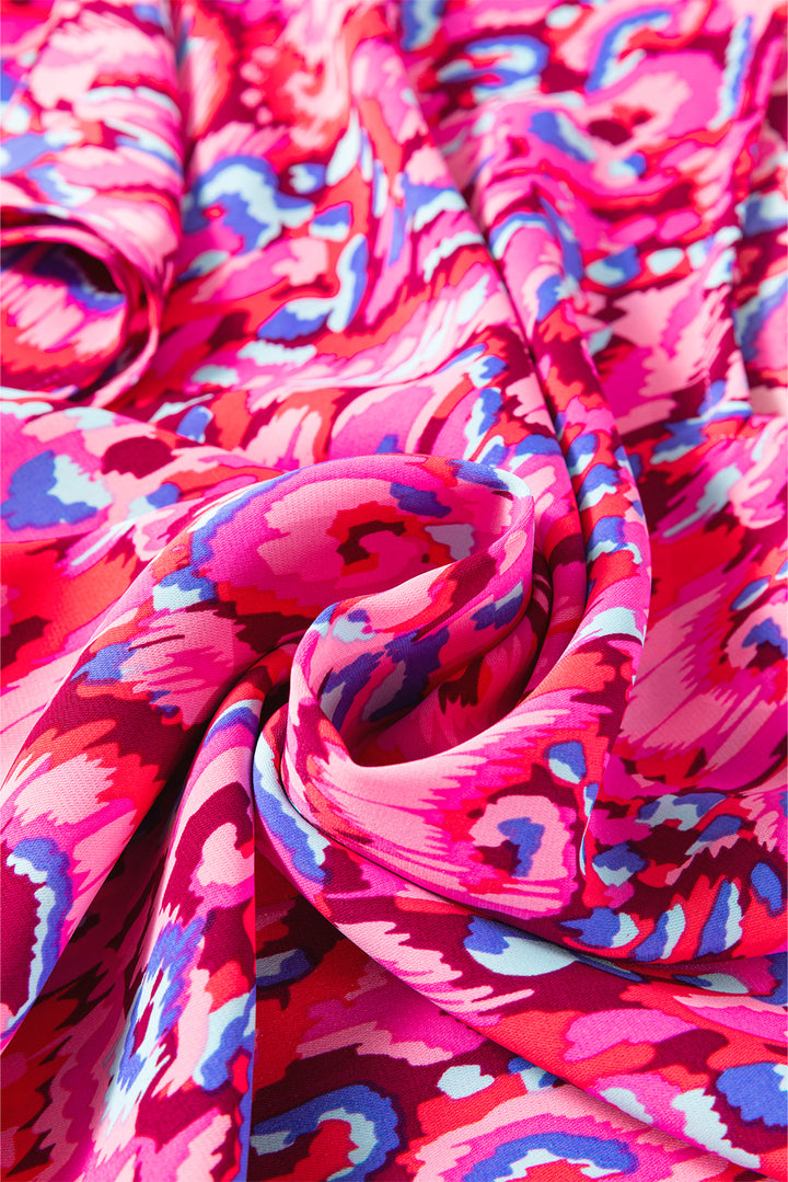 Chemisier tunique ample rose à imprimé abstrait, col en V et manches mi-longues
