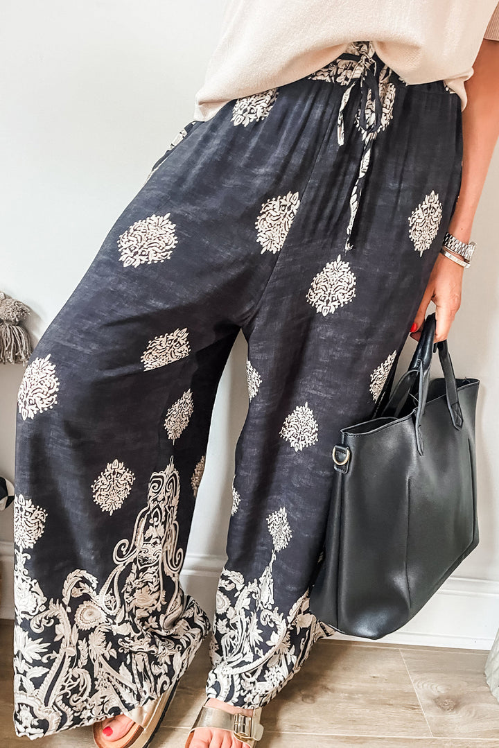 Pantalon large noir à imprimé bohème avec cordon de serrage à la taille