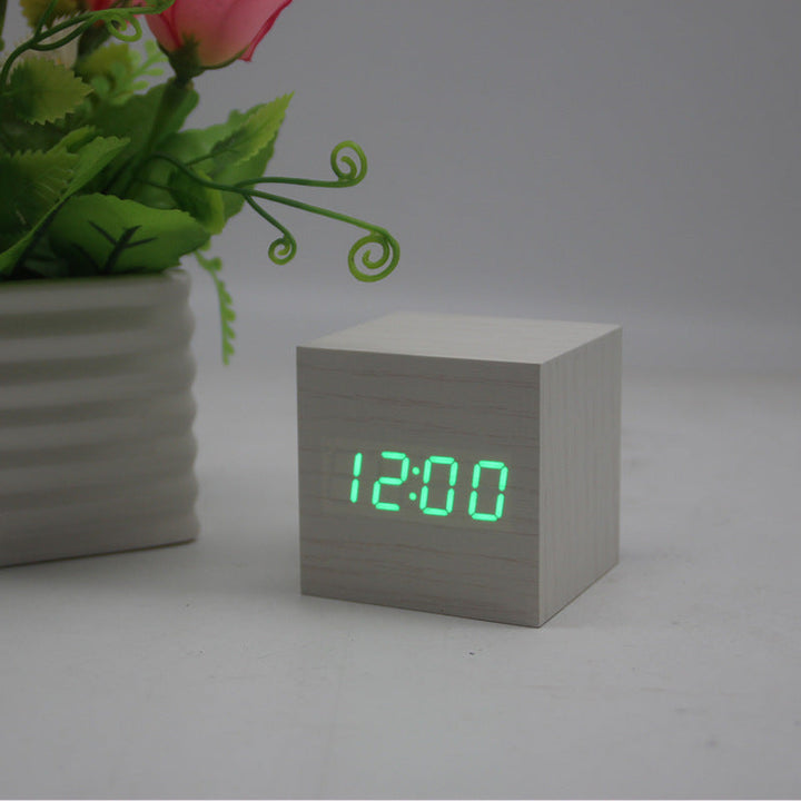 Minimalist Cube shaped sound-sensitive wooden digital clock with temperature display