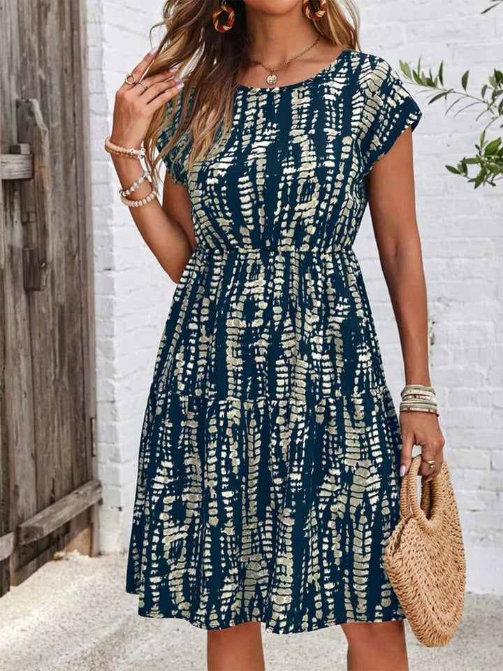 Plus Size Printed Long Sleeve Ruffle Hem Mini Dress