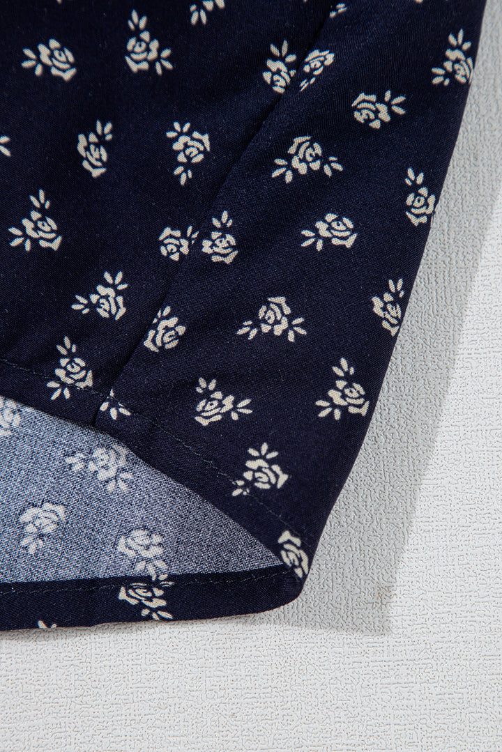 Débardeur bleu à imprimé floral et bretelles spaghetti boutonnées à col en V