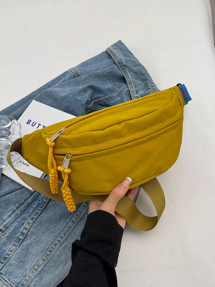 Lightweight Crossbody Bag with Tassel Detail