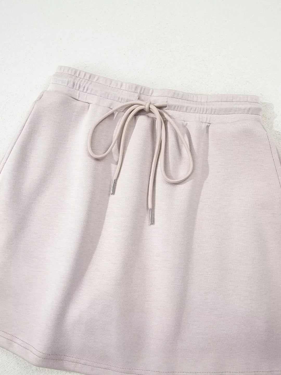 Solid Color Drop Shoulder Pullover and Drawstring Mini Skirt 2pcs Outfit