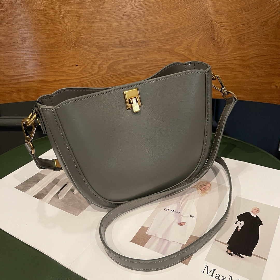 New Genuine Leather Saddle Bag, Versatile Commuter Women's Bag, Single Shoulder And Crossbody, Top-grain Cowhide, Simple And Stylish Shell Bag