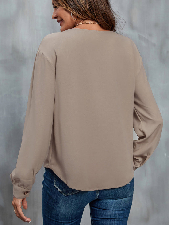 Perfee Asymmetrical Neck Buttoned Long Sleeve Top