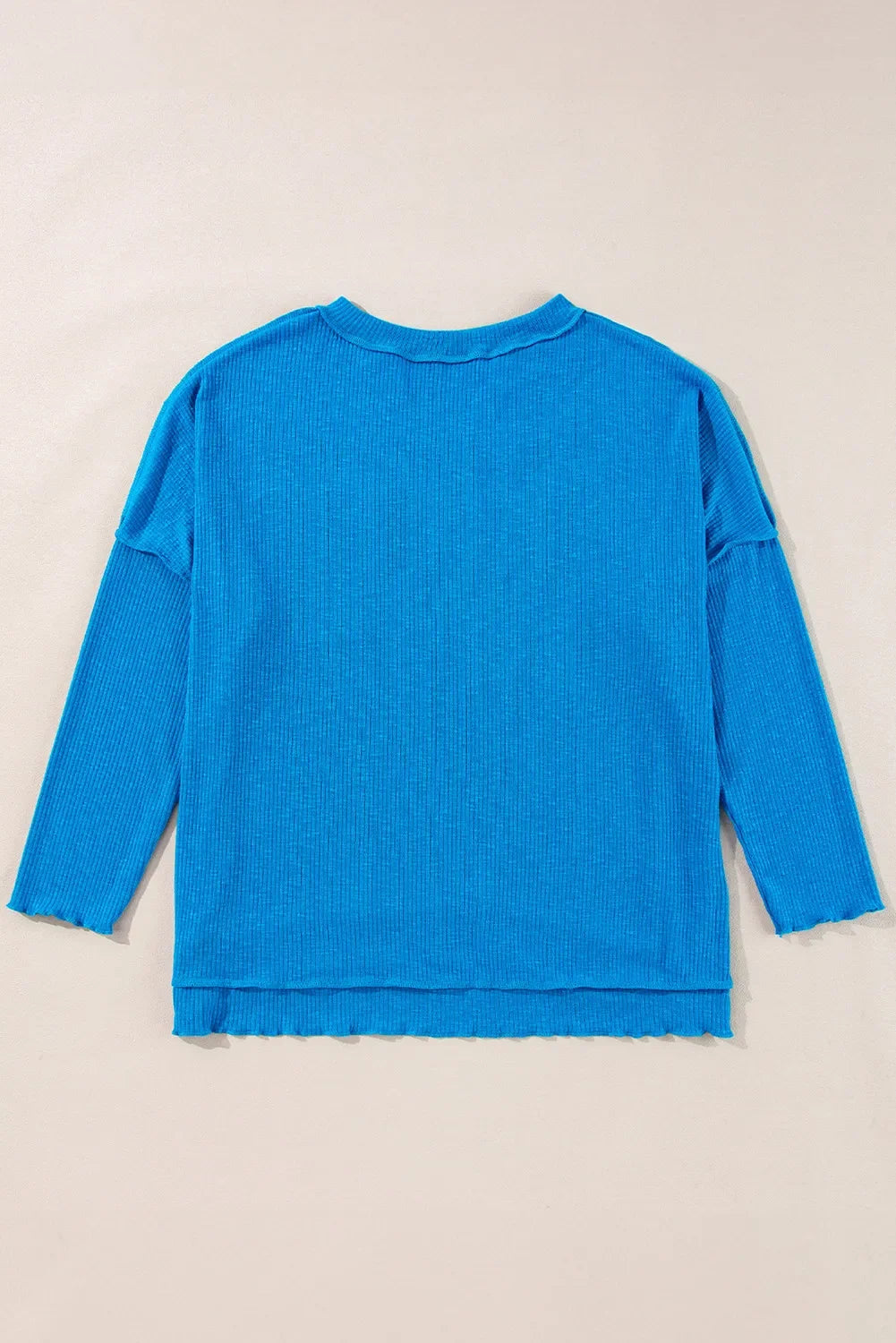 Exposed Seam Notched Long Sleeve Blouse