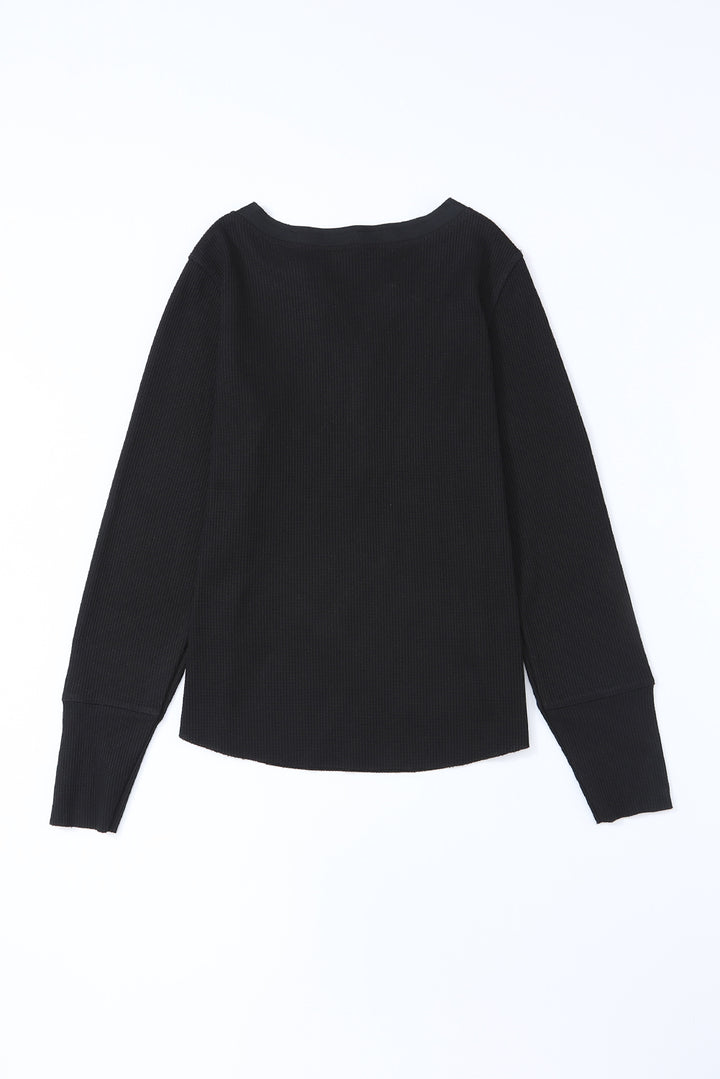 Haut Henley en tricot gaufré à encolure bordée de noir