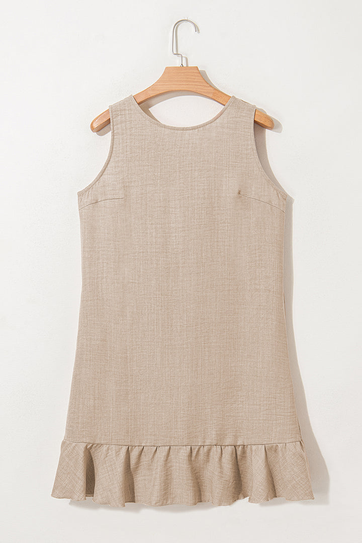 Robe courte sans manches gris fumé à dos échancré et ourlet à volants