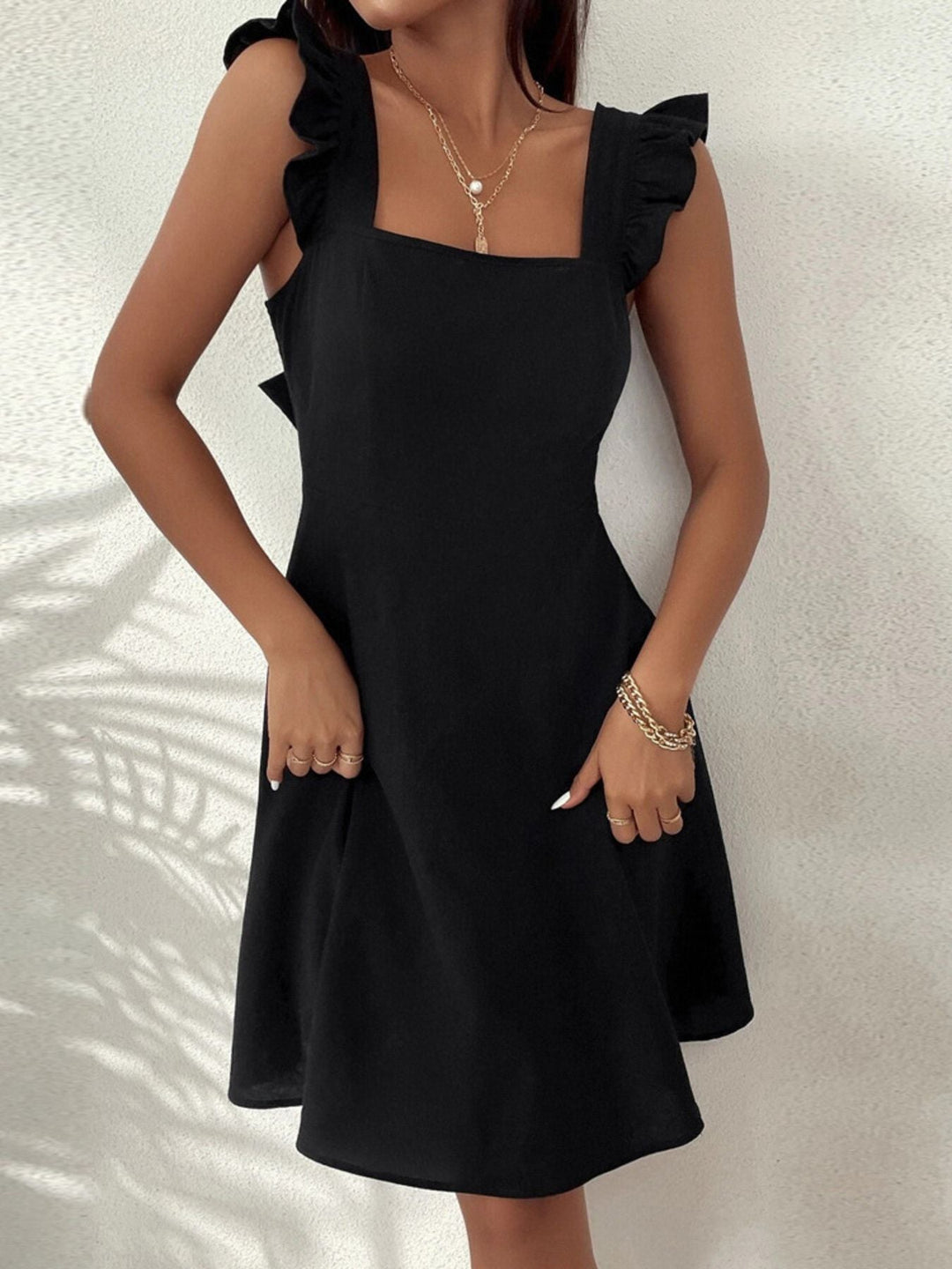 Ruffled Tie Back Mini Dress
