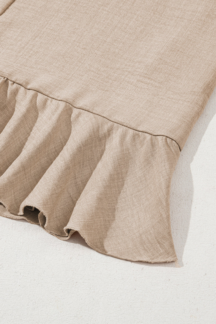 Robe courte sans manches gris fumé à dos échancré et ourlet à volants