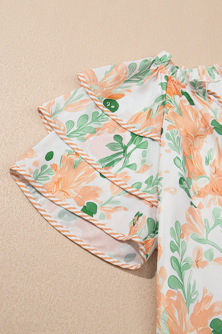 Mini-robe orange à manches courtes et bordures contrastées à fleurs